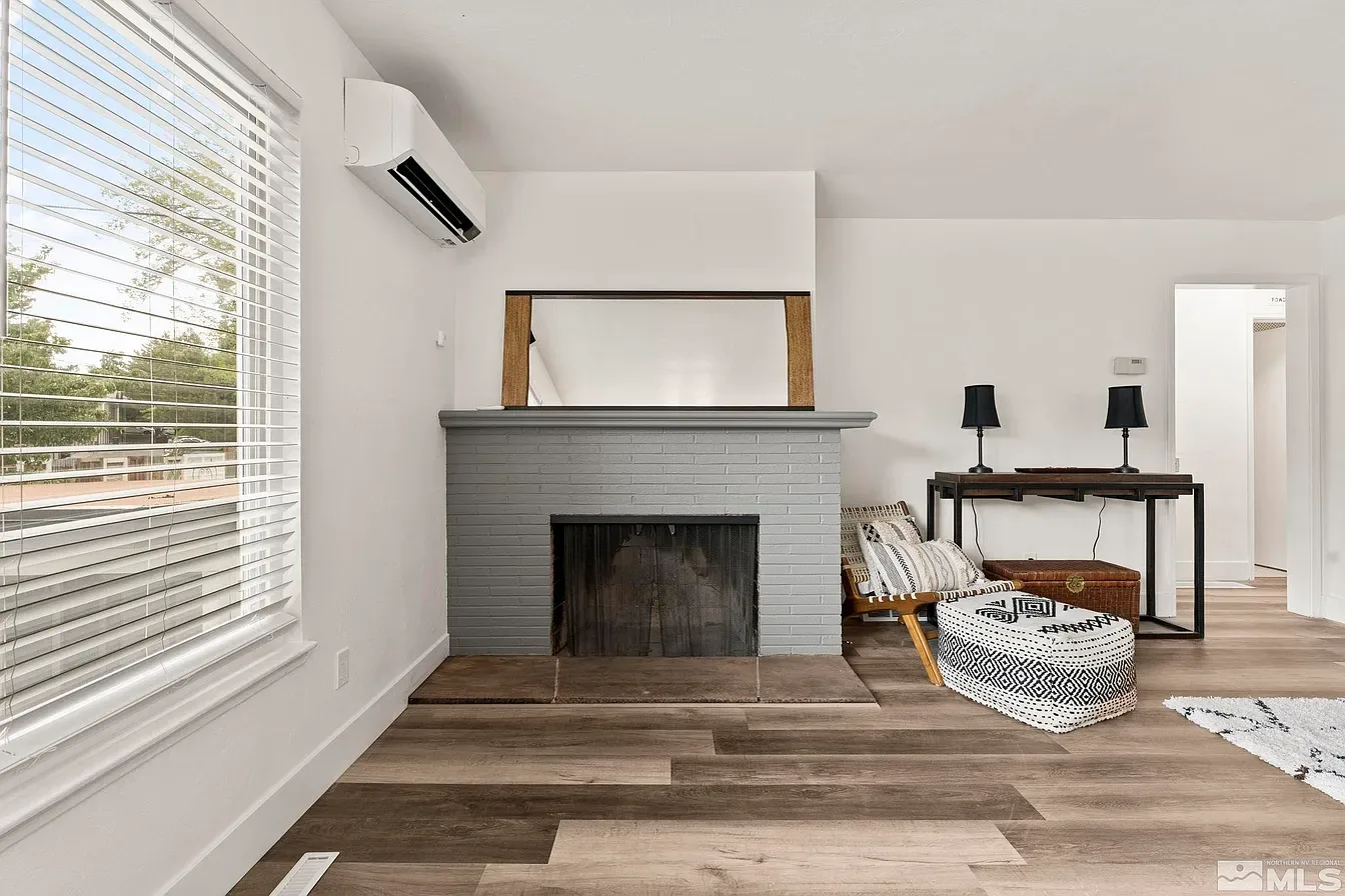 Glenmanor fireplace before: sparsely furnished room with bare mantel